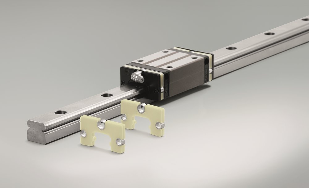 Ten times more service life for linear guides in robotic welding applications